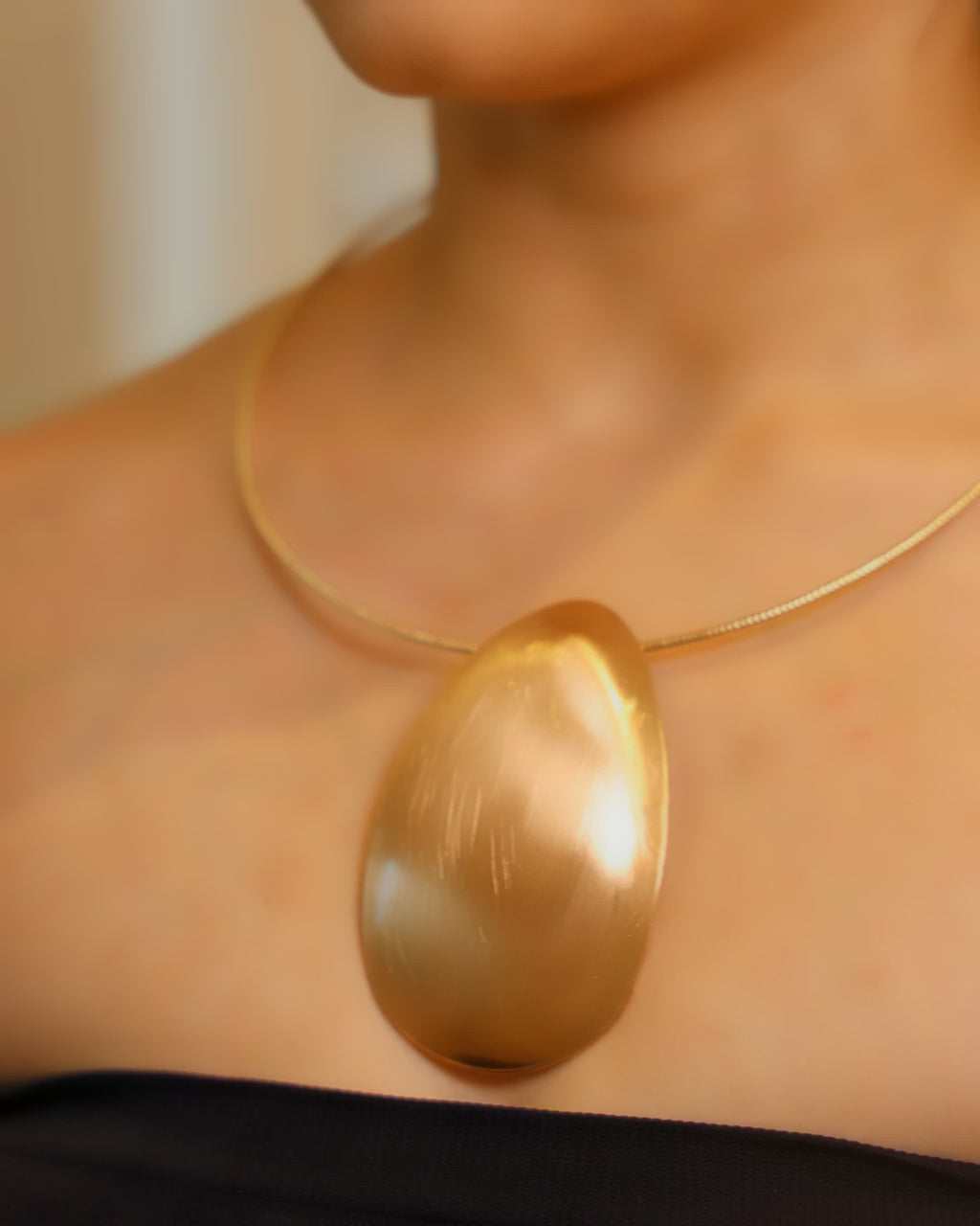 Golden Polished Oval Pendant