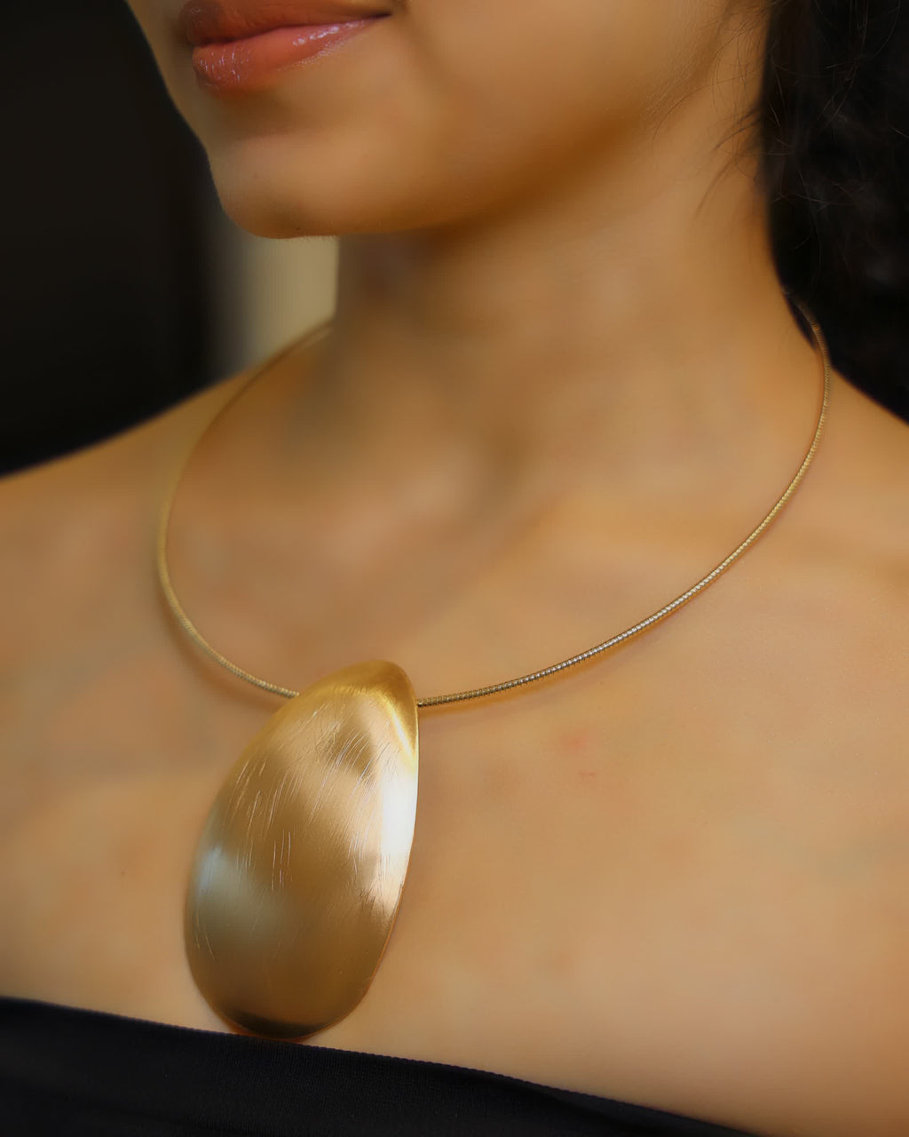 Golden Polished Oval Pendant