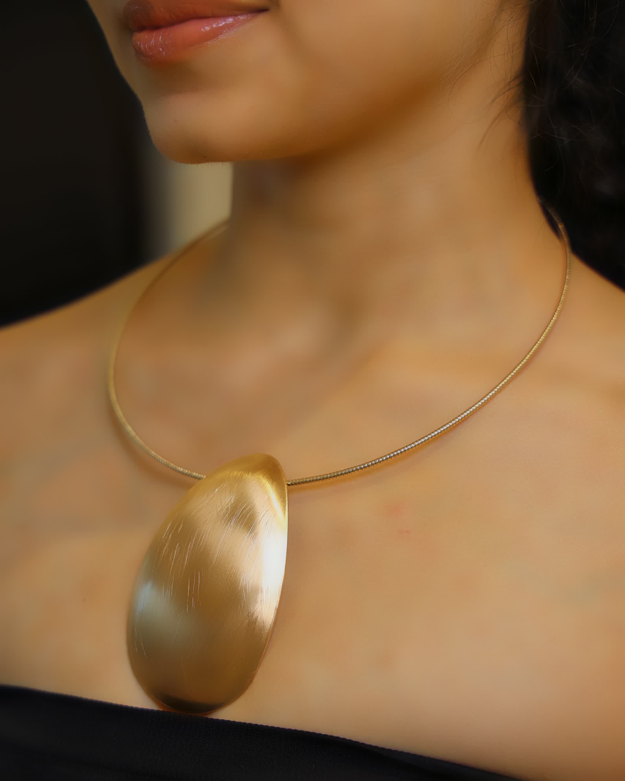 Golden Polished Oval Pendant