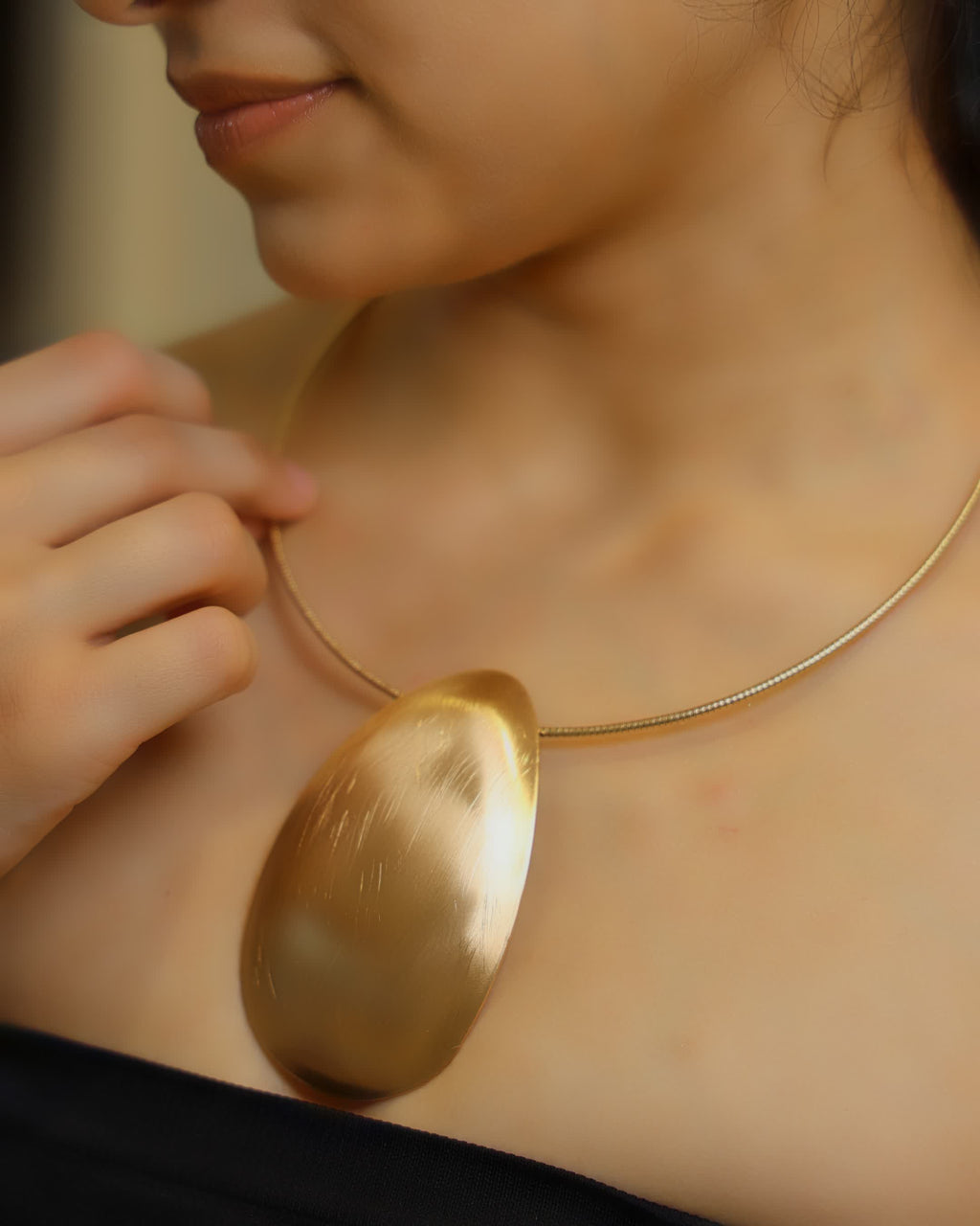 Golden Polished Oval Pendant