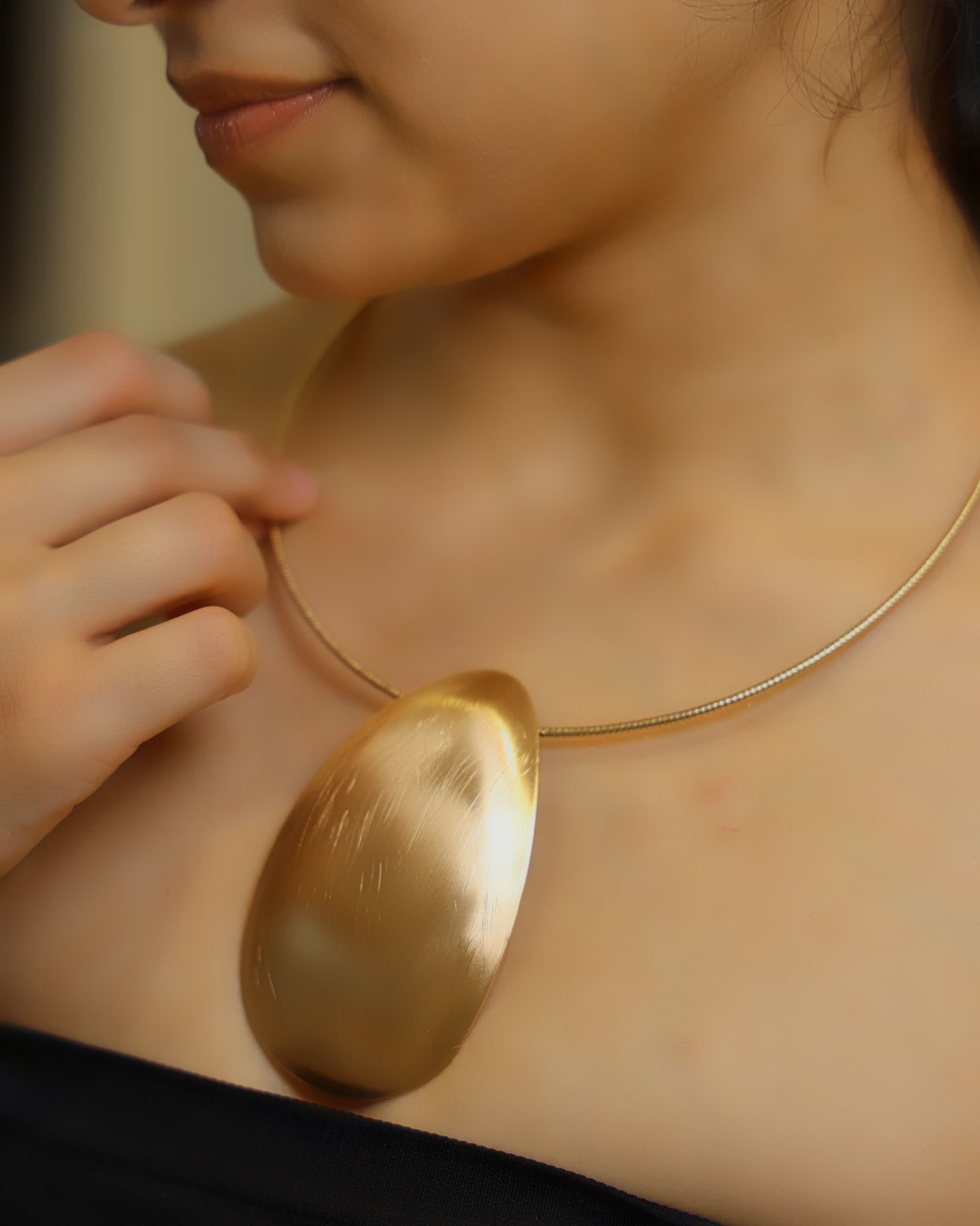 Golden Polished Oval Pendant